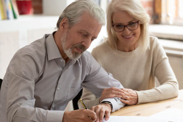 Older couple with estate planning documents